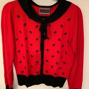 Jawbreaker Cardigan with skulls.